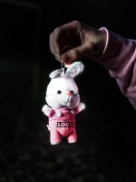 Pink bunny to hang on your bag. Reflective and customizable
